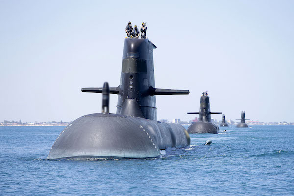 Collins Class submarines HMAS Collins, HMAS Farncomb, HMAS Dechaineux and HMAS Sheean in formation while transiting through Cockburn Sound, Western Australia. Collins Class submarines are an essential part of Australia’s naval capability, providing a strategic advantage in terms of surveillance and protection of our maritime approaches. *** Local Caption *** Royal Australian Navy Collins Class Submarines, HMAS Collins, HMAS Farncomb, HMAS Dechaineux and HMAS Sheean sail in formation while transiting through Cockburn Sound, Western Australia, in February 2019.