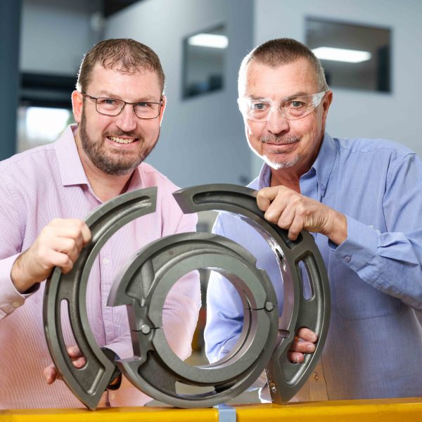 Axiom Precision Manufacturing general manager Craig Maynard and ASC subcontracts administrator Tim Bowes